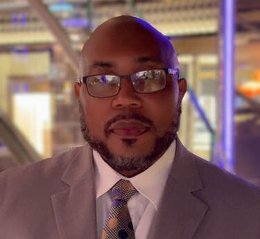 Dr. Giri J. Peterson Headshot